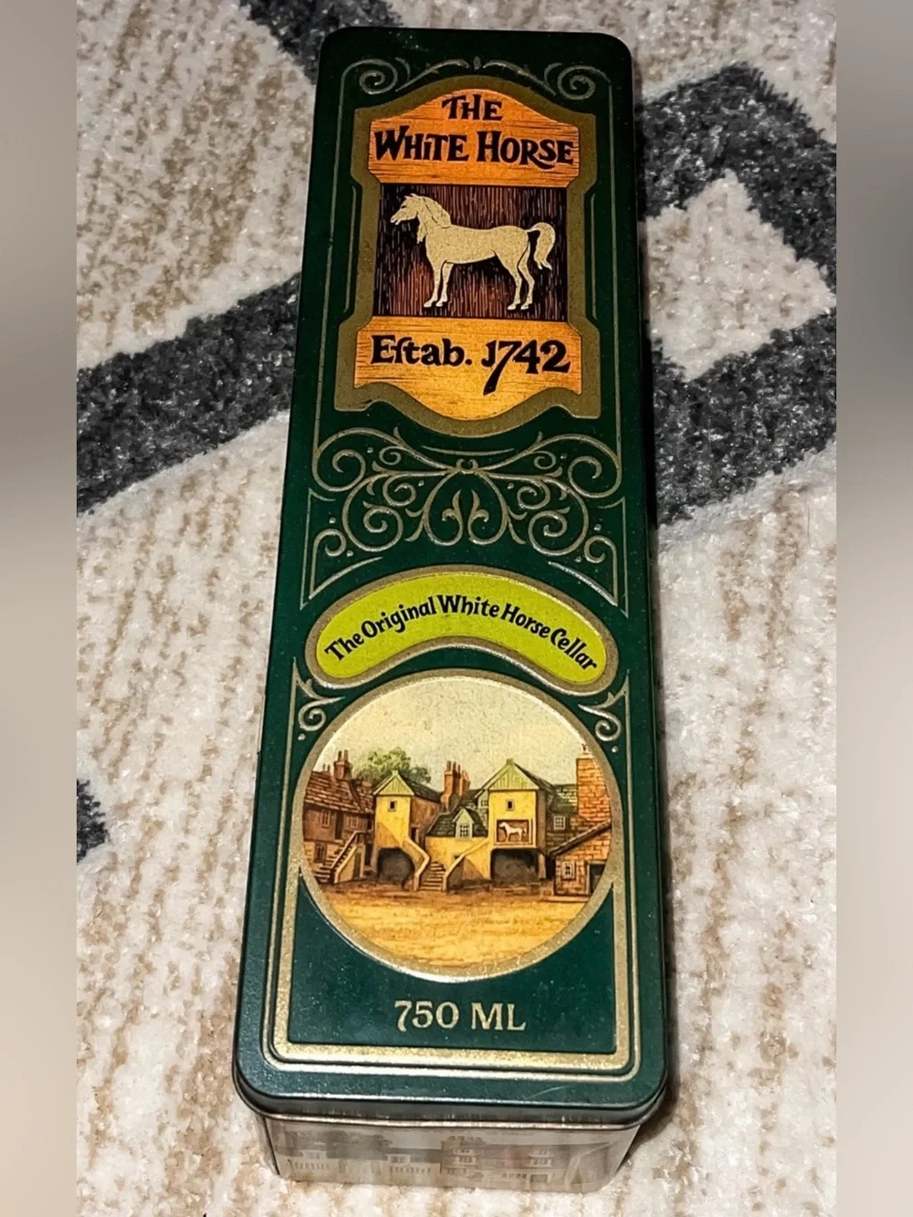 Vintage white horse Scottish whiskey tin. Good condition.